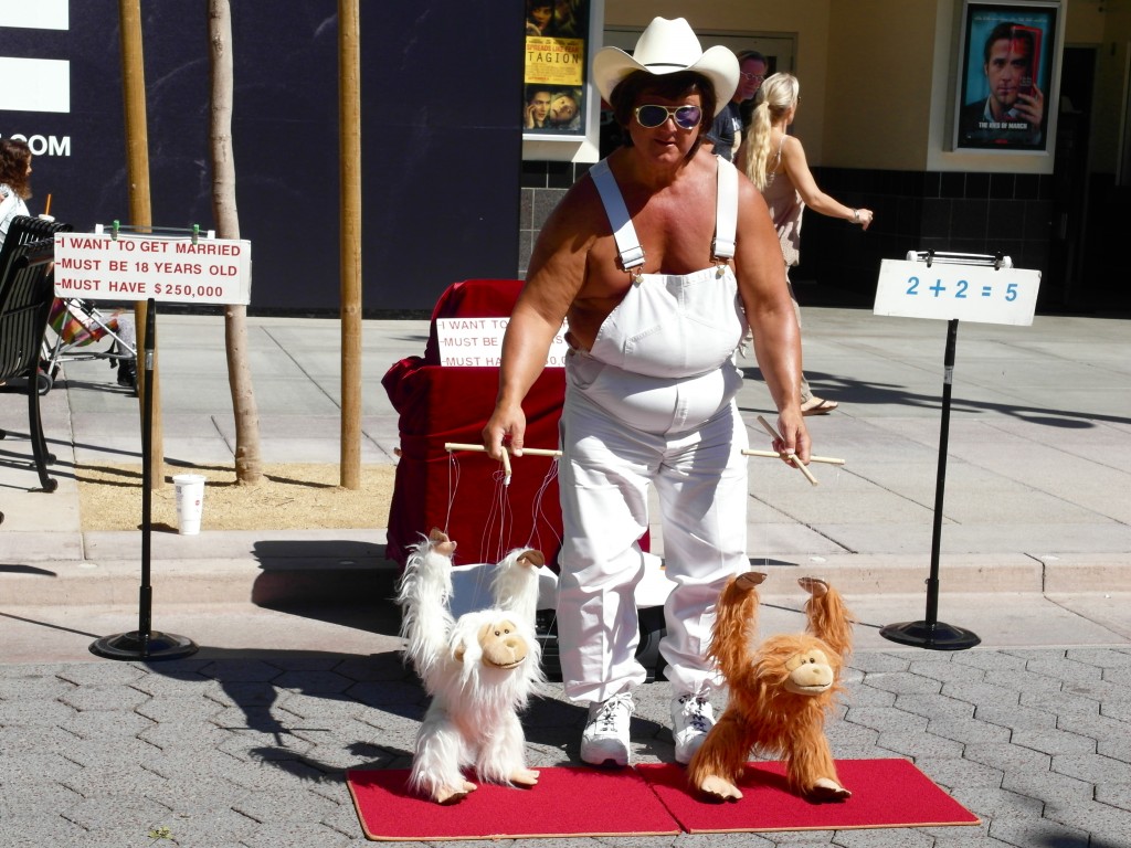 Man With Monkey Puppets