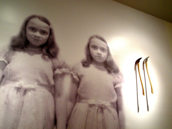 The image of these girls loomed over the room devoted to "The Shining" (where there were also ominous axes in the wall)