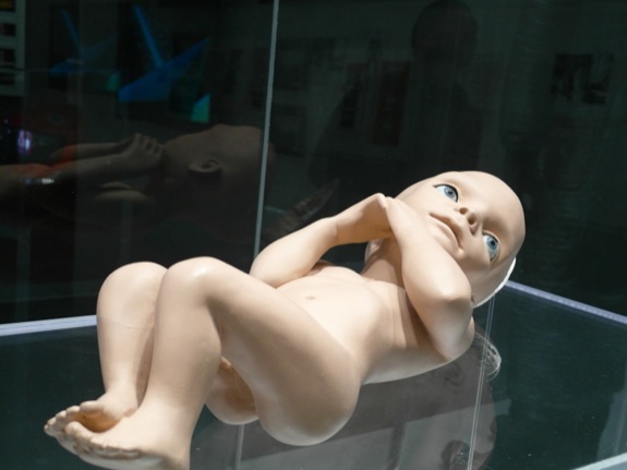 The infant from "2001: A Space Odyssey" encased in glass